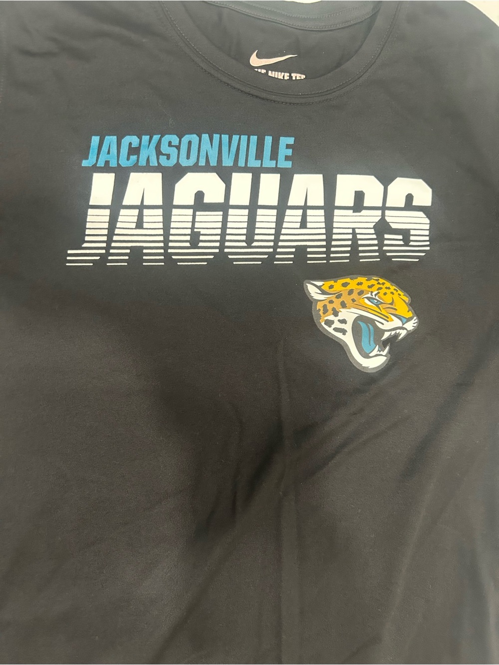 Nike Black Jacksonville Jaguars Graphic Tee with Teal Accents